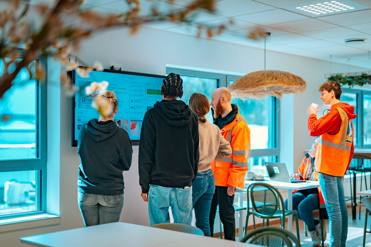 semin employees using the steeple touchscreen